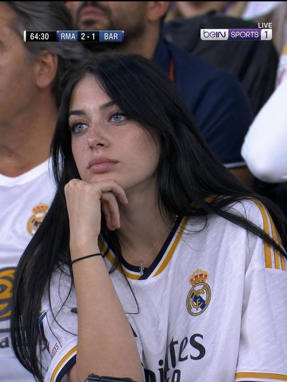 Pensive Real Madrid Fan in Stadium Broadcast AI portrait template preview